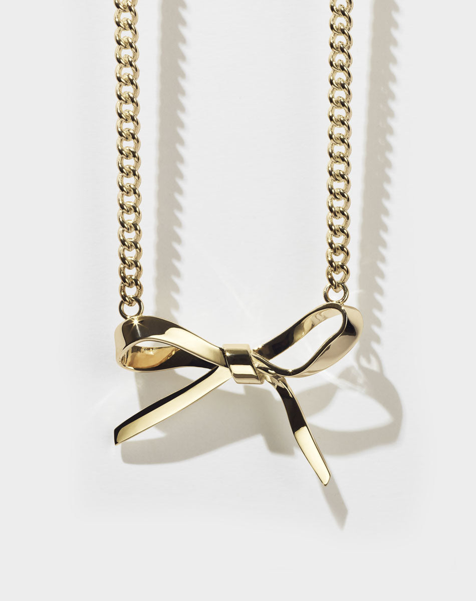 Kate spade bow on sale necklace