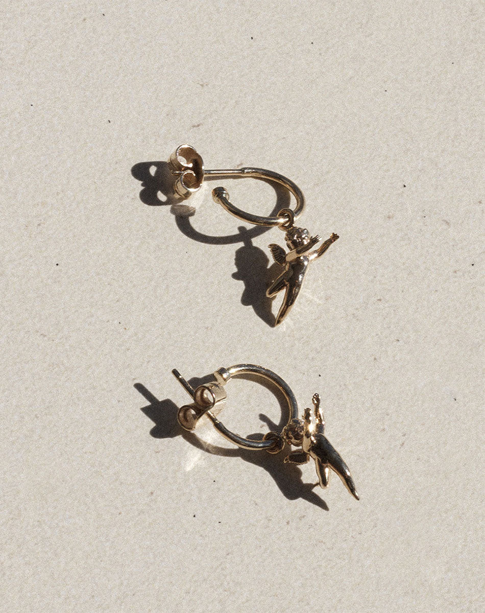 Cherub hoop earrings store
