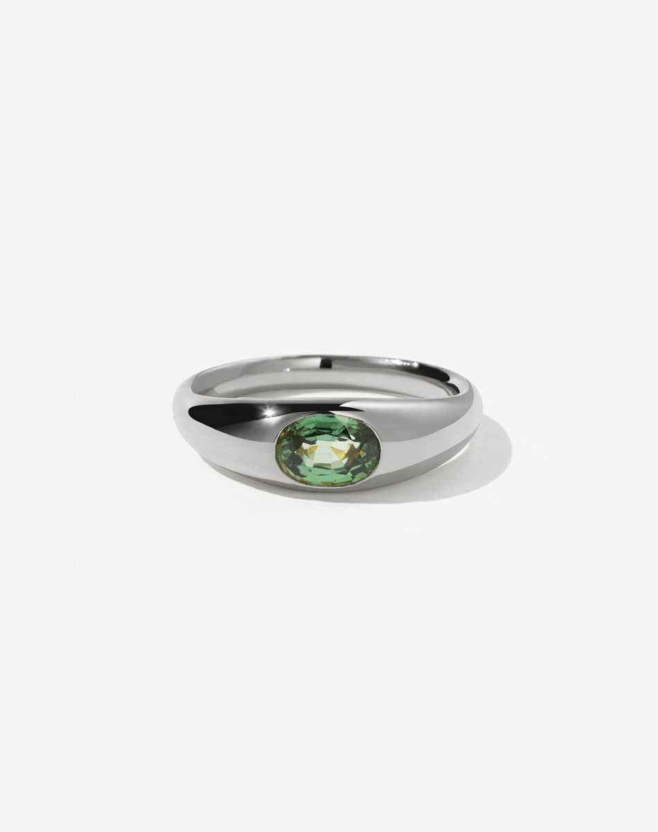 Platinum ring with 2025 green stone