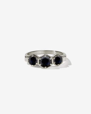 Meadowlark Jewellery’s classic 3 Hexagon Stone Engagement Ring in 18ct White Gold, claw set with round brilliant cut midnight sapphire. A bold and beloved 3 stone ring, this Ceremonial design is made to order in New Zealand.