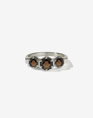 Meadowlark Jewellery’s classic 3 Hexagon Stone Engagement Ring in 18ct White Gold, claw set with round brilliant cut smoky quartz. A bold and beloved 3 stone ring, this Ceremonial design is made to order in New Zealand.