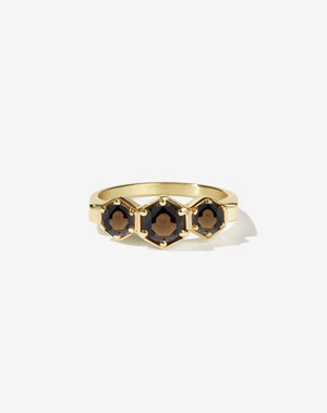 Meadowlark Jewellery’s classic 3 Hexagon Stone Engagement Ring in 18ct Yellow Gold, claw set with round brilliant cut smoky quartz. A bold and beloved 3 stone ring, this Ceremonial design is made to order in New Zealand.