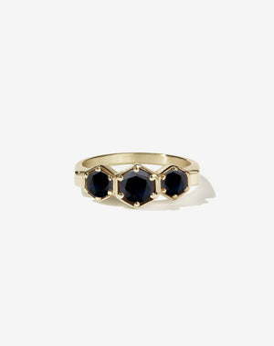 Meadowlark Jewellery’s classic 3 Hexagon Stone Engagement Ring in 9ct Yellow Gold, claw set with round brilliant cut midnight sapphire. A bold and beloved 3 stone ring, this Ceremonial design is made to order in New Zealand.