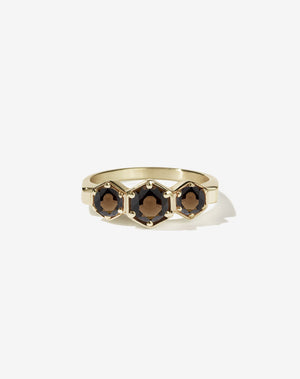 Meadowlark Jewellery’s classic 3 Hexagon Stone Engagement Ring in 9ct Yellow Gold, claw set with round brilliant cut smoky quartz. A bold and beloved 3 stone ring, this Ceremonial design is made to order in New Zealand.