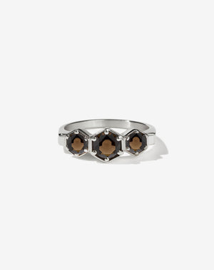 Meadowlark Jewellery’s classic 3 Hexagon Stone Engagement Ring in Platinum, claw set with round brilliant cut smoky quartz. A bold and beloved 3 stone ring, this Ceremonial design is made to order in New Zealand.