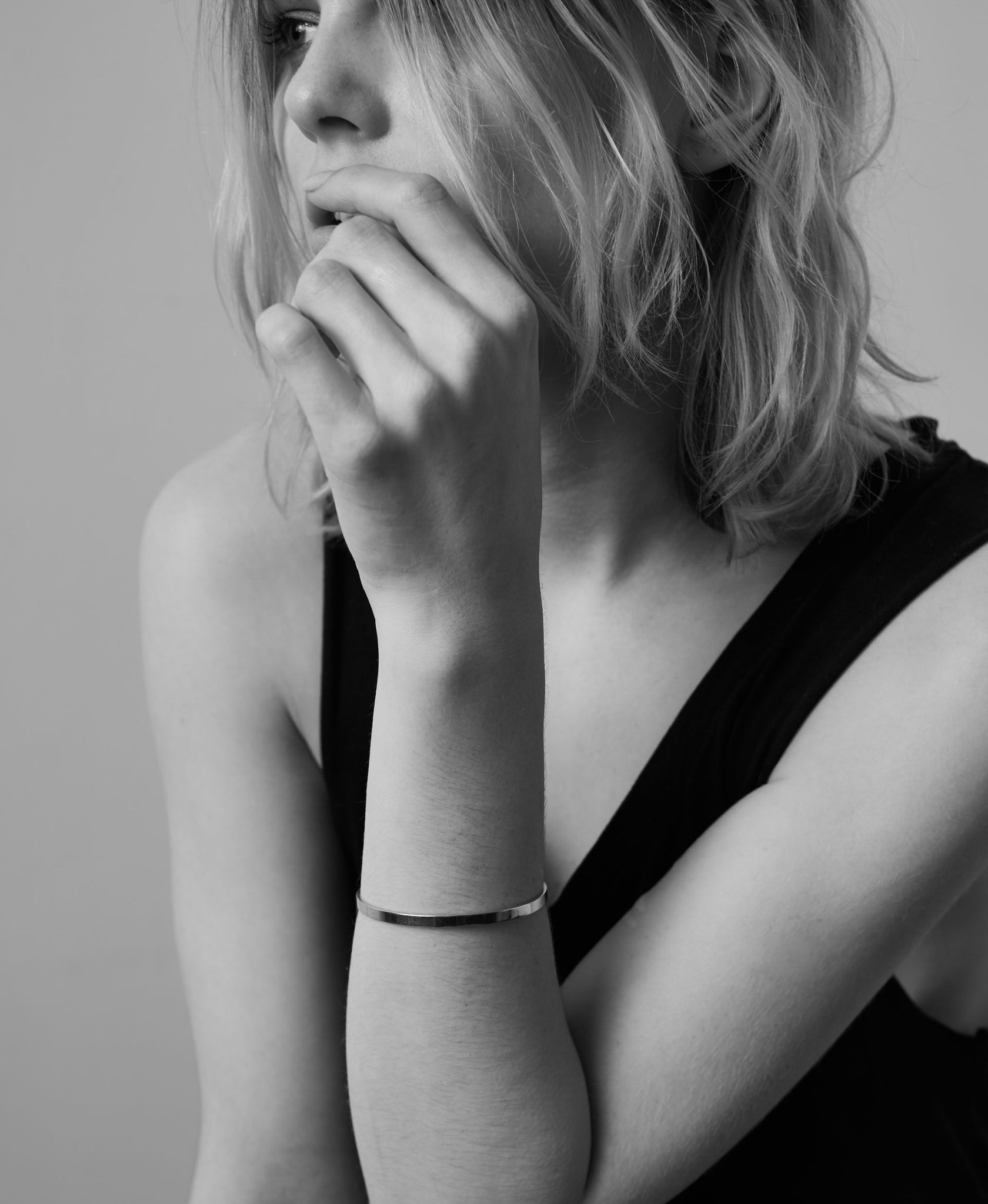 Women wearing a plain flat 4mm wide bangle