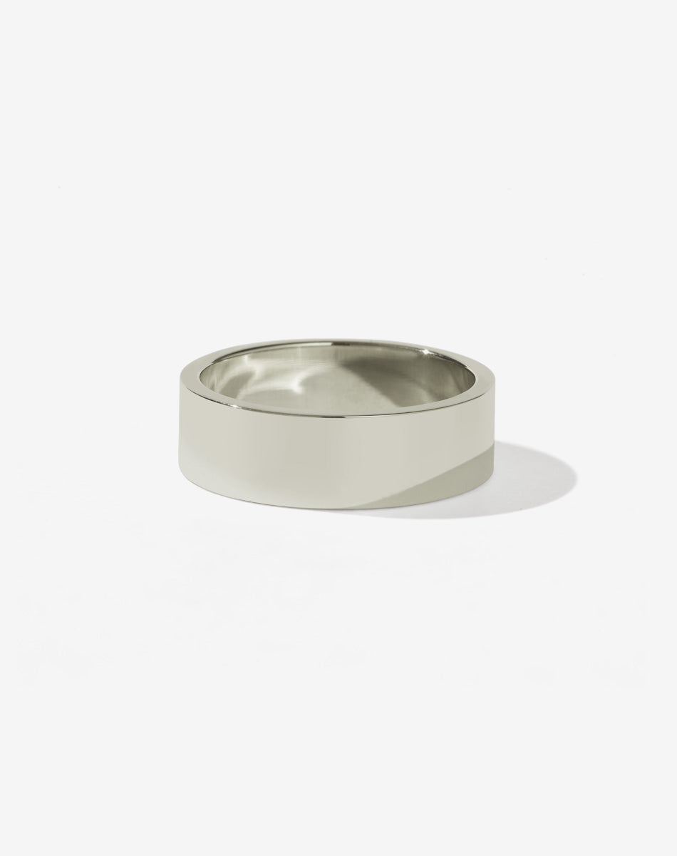 A 6mm plain white gold band ring. Mens wedding ring.
