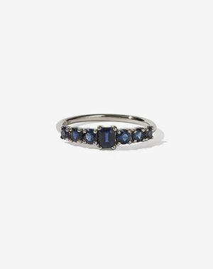 Meadowlark Jewellery’s beautiful Amelie Engagement Ring in 18ct White Gold, claw set with emerald cut and round brilliant cut blue sapphires atop a fine round band. Fully traceable and ethically sourced blue and green sapphires from Queensland, Australia. A low set, petite seven stone engagement ring this Ceremonial design made to order in New Zealand.