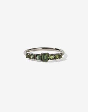 Meadowlark Jewellery’s beautiful Amelie Engagement Ring in 18ct White Gold, claw set with emerald cut and round brilliant cut green sapphires atop a fine round band. Fully traceable and ethically sourced blue and green sapphires from Queensland, Australia. A low set, petite seven stone engagement ring this Ceremonial design made to order in New Zealand.