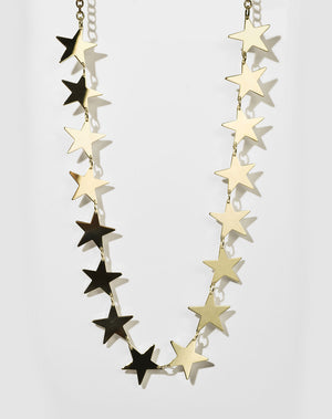 A gold necklace with a series of star-shaped charms linked together.