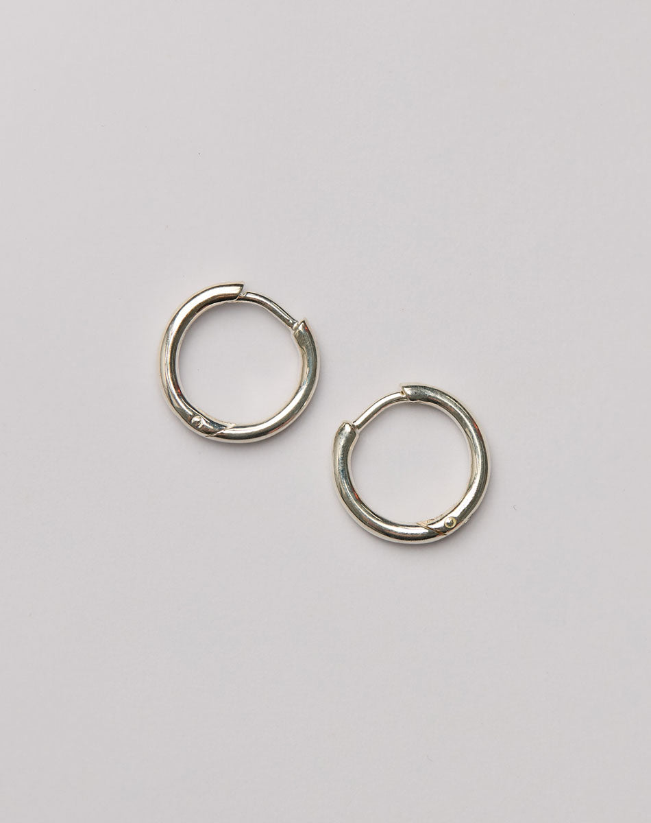 Pair of sterling silver hoop huggie earrings 