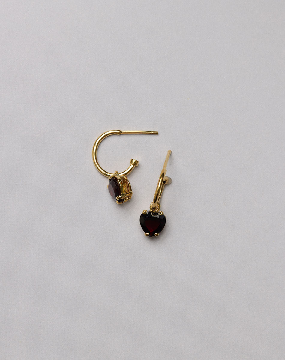 Gold hoop earrings with red heart garnet gemstone charms