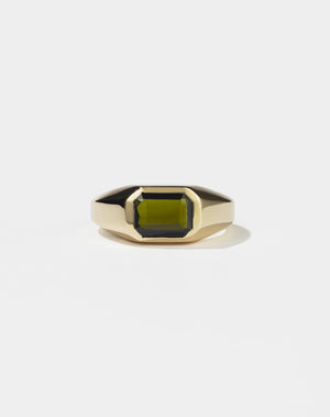 Meadowlark Jewellery's bold Limited Edition Milan Ring in 9ct Yellow Gold, bezel set with an emerald-cut green tourmaline stone. A classic and timeless design, perfect as a wedding band or a minimalist piece for everyday. Made to order in New Zealand, at the Meadowlark workshop.