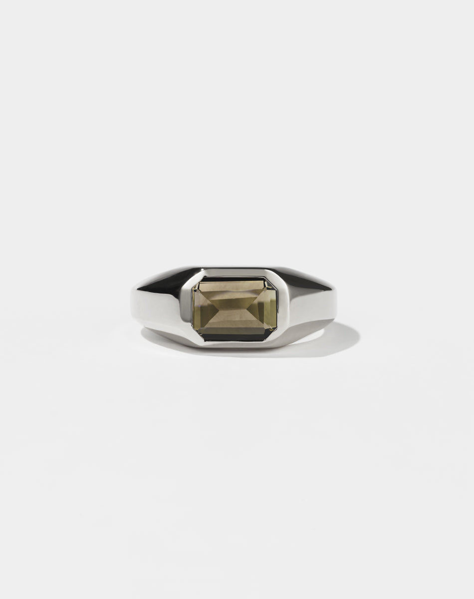 A sterling silver ring with a smoky quartz on a white background. Made by Meadowlark in New Zealand.