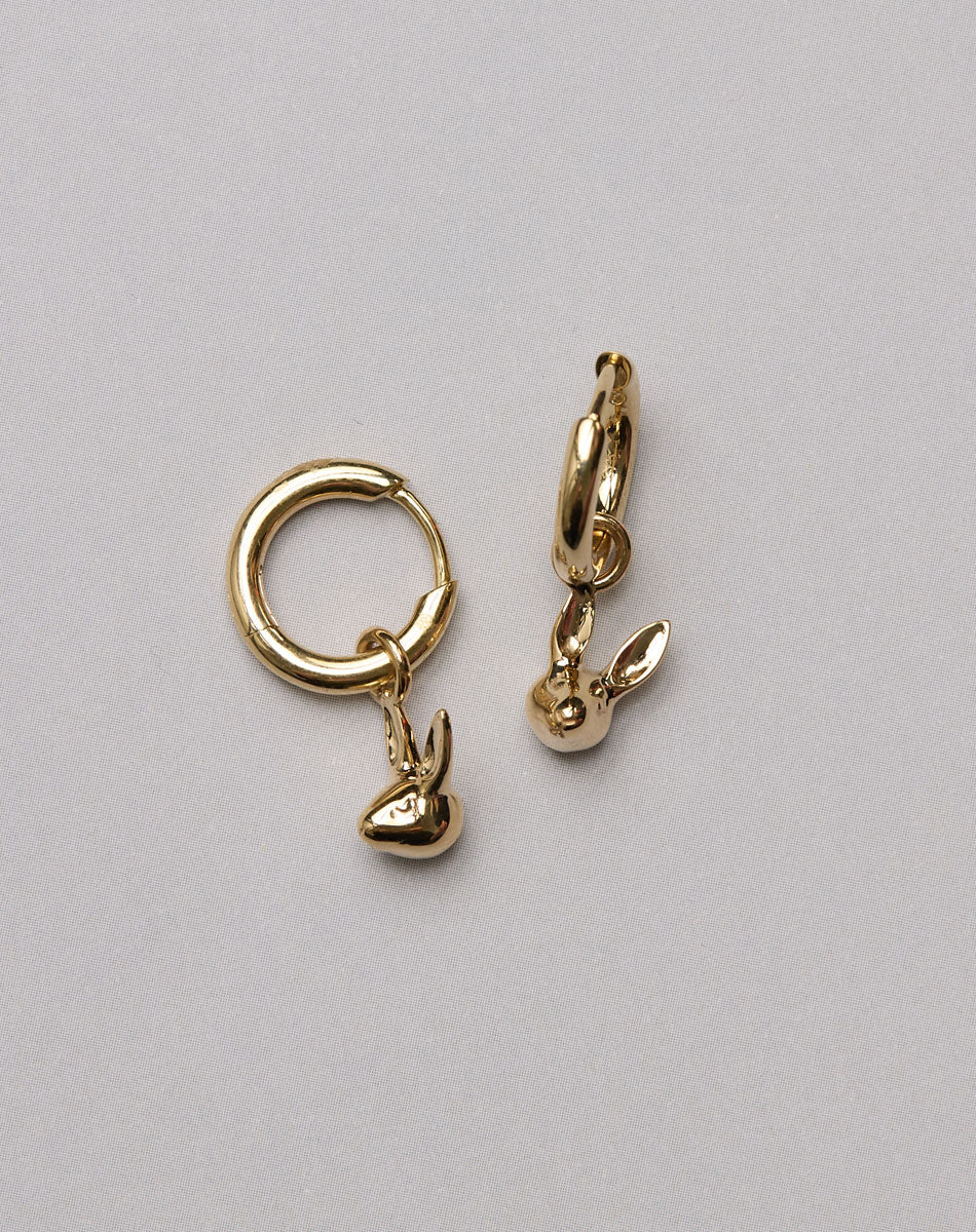 Gold hoop earrings with bunny rabbit charms