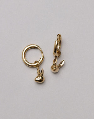 Gold hoop earrings with bunny rabbit charms