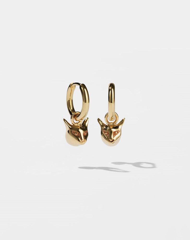 Gold hoop earrings with small cat charms 