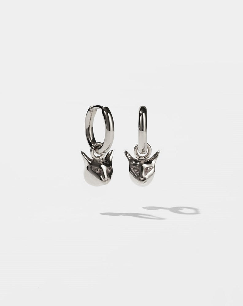Silver hoop earrings with small cat head charms