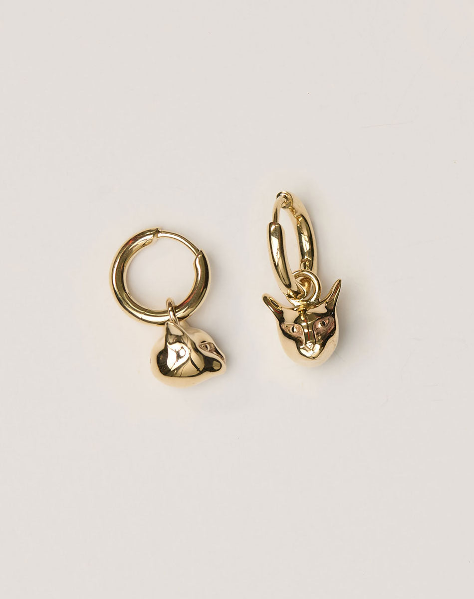 Gold hoop earrings with cat charms 
