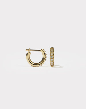 Halo Huggies Pave Earring in 9ct Yellow Gold with round brilliant cut, French pave set white diamonds. Featuring a lever or clicker back earring closure. Inner diameter approximately 7mm.