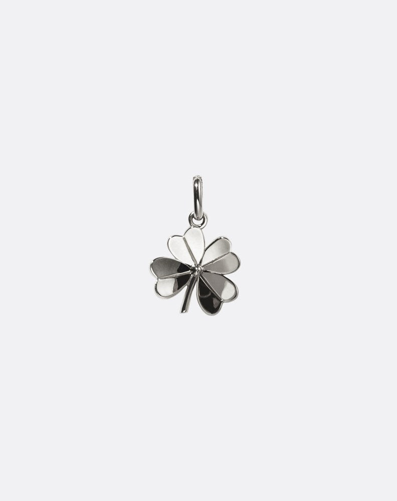 Silver four-leaf clover pendant on a white background