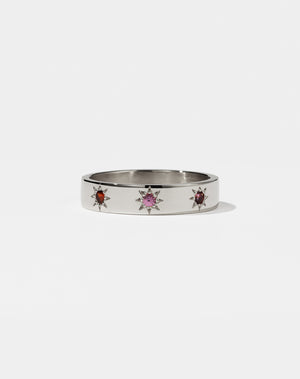 Meadowlark Jewellery's Lulu 3 Star Band in Sterling Silver with star set round brilliant cut Amethyst, Pink Sapphire, African Garnet. 4.5mm width wedding band.