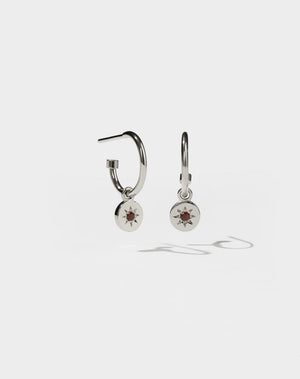 Lulu Signature Hoop Earrings in Sterling Silver with star set African Garnet. 6mm in diameter.