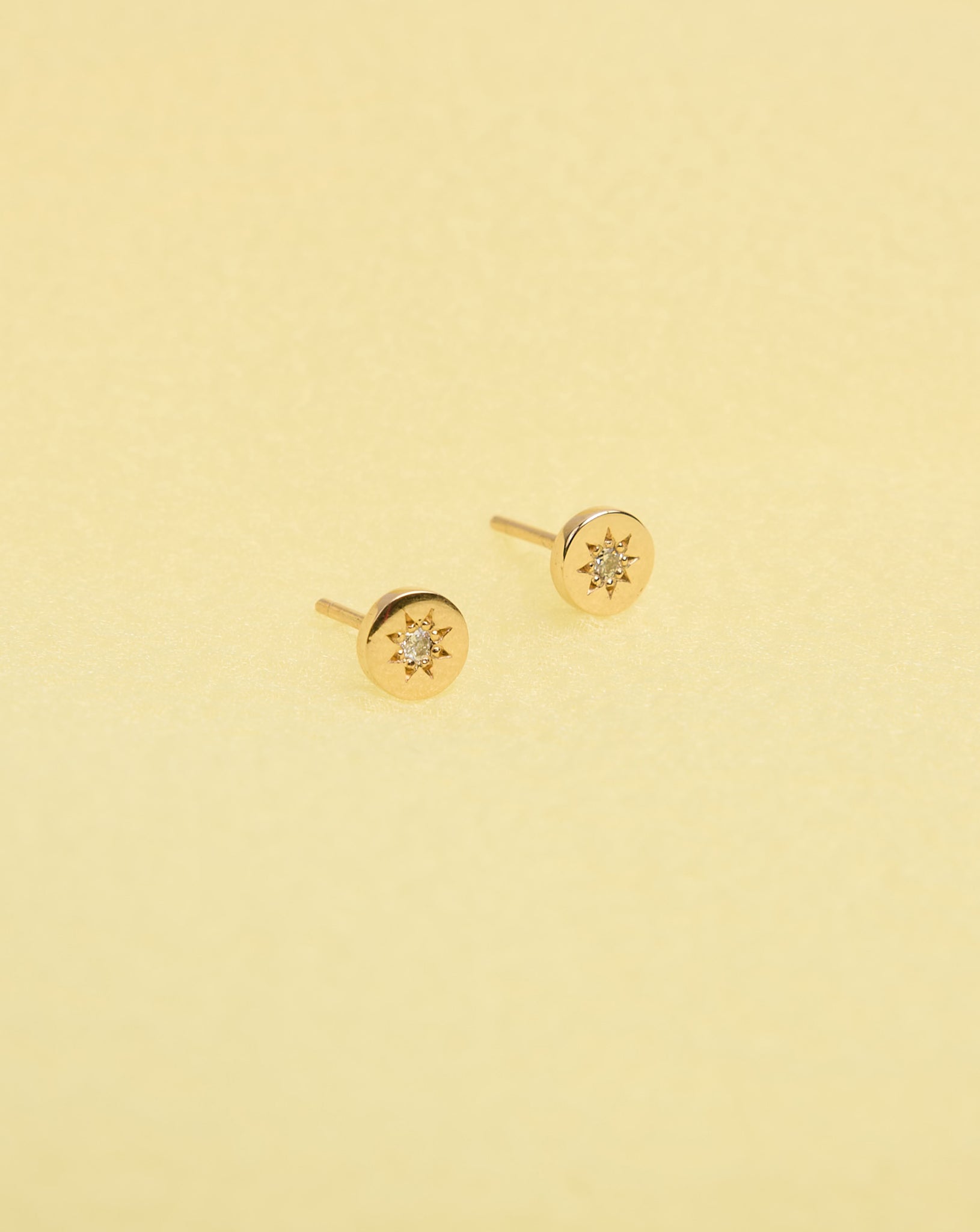 Lulu Stud Earrings in 23k Gold Plated or 9ct Yellow Gold with star set White Diamond. 6mm in diameter.