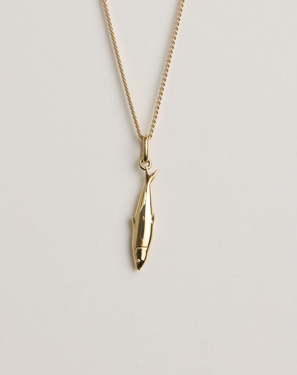 Gold necklace with a sardine pendant 