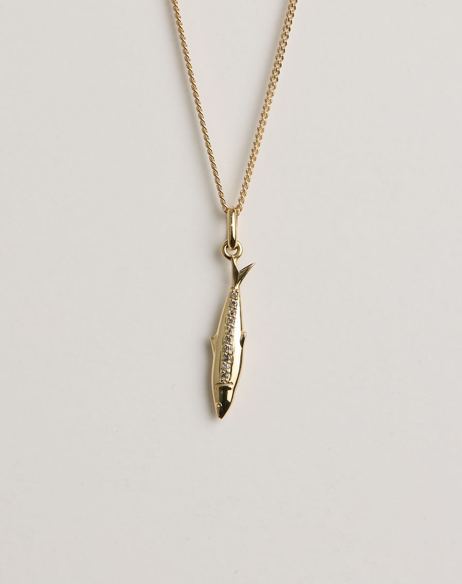 Gold necklace with a sardine pendant set with diamonds 