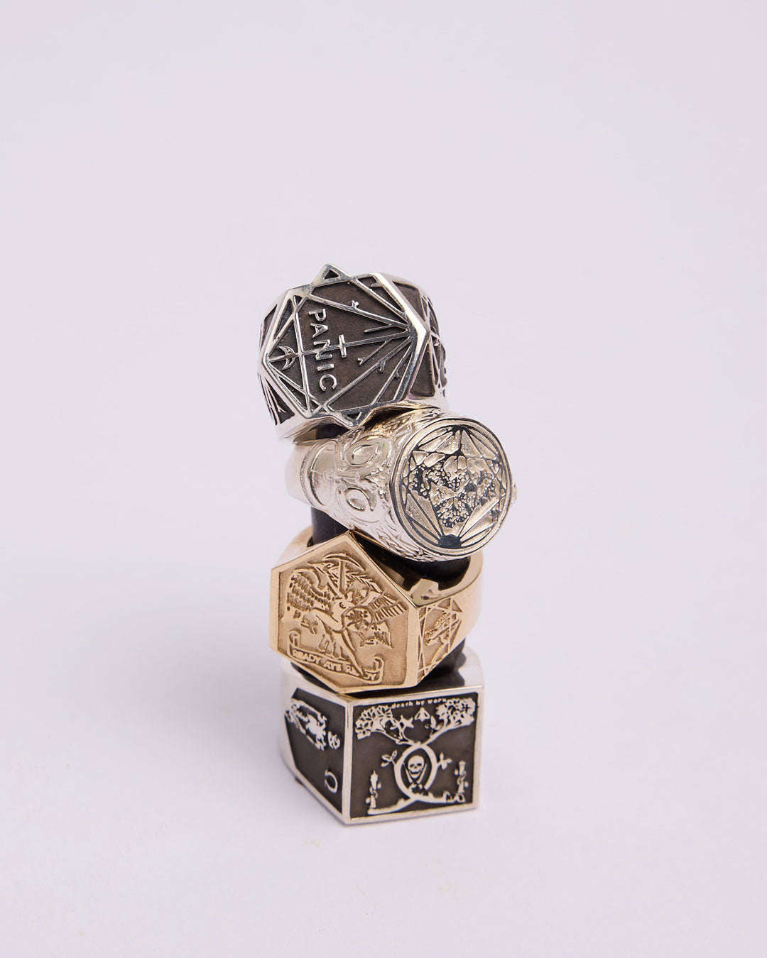 A series of chunky signet rings in collaboration with artist Andrew Mcleod