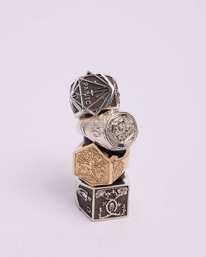 A series of chunky signet rings in collaboration with artist Andrew Mcleod