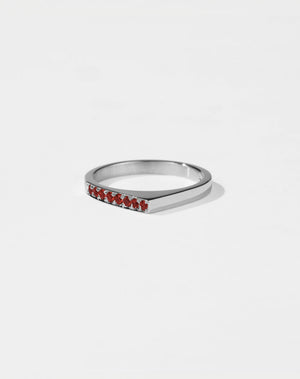 Meadowlark Jewellery’s architectural Geo Ring Point in Sterling Silver, pave set with twelve round brilliant cut red sapphires atop a 1.5mm. A striking piece designed to be worn with the Geo Flat & Geo Arc rings, or alone for a refined and minimal look. From the Dreams collection.