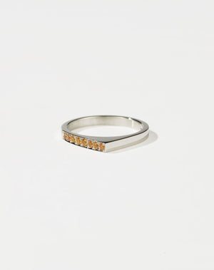 Meadowlark Jewellery’s architectural Geo Ring Point in Sterling Silver, pave set with twelve round brilliant cut yellow sapphires atop a 1.5mm. A striking piece designed to be worn with the Geo Flat & Geo Arc rings, or alone for a refined and minimal look. From the Dreams collection.