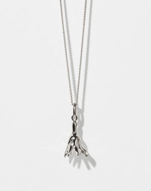 Meadowlark Jewellery’s Magda Charm Necklace in Sterling Silver. A single bell-shaped flower charm suspended from a fine diamond curb chain. A symbol of quiet transformation and the tender strength of nature. From the Dreams collection.