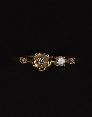 Meadowlark Jewellery’s floral Posie Band in 9ct Yellow Gold, set with round brilliant cut white diamonds. Inspired by classic floral motifs and our beloved Alba designs, a timeless symbol of grace, growth and renewal. Celebrating life’s continual renewal. From the Dreams collection.