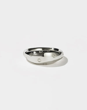 A sterling silver ring with a design resembling a strawberry with seeds.