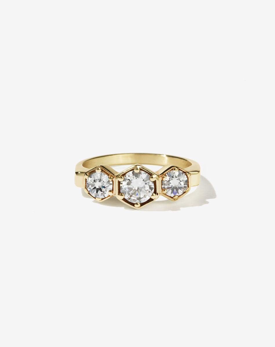 Meadowlark Jewellery’s classic 3 Hexagon Stone Engagement Ring in 18ct Yellow Gold, claw set with round brilliant cut green sapphires. Fully traceable and ethically sourced blue and green sapphires from Queensland, Australia. A bold and beloved 3 stone ring, this Ceremonial design is made to order in New Zealand. 