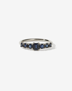 Meadowlark Jewellery’s beautiful Amelie Engagement Ring in 9ct White Gold, claw set with emerald cut and round brilliant cut blue sapphires atop a fine round band. Fully traceable and ethically sourced blue and green sapphires from Queensland, Australia. A low set, petite seven stone engagement ring this Ceremonial design made to order in New Zealand.