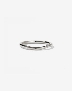 A simple, elegant plain band ring in white gold, suitable as a wedding ring or for everyday wear.