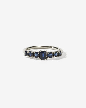 Meadowlark Jewellery’s beautiful Amelie Engagement Ring in 14ct White Gold, claw set with emerald cut and round brilliant cut blue sapphires atop a fine round band. Fully traceable and ethically sourced blue and green sapphires from Queensland, Australia. A low set, petite seven stone engagement ring this Ceremonial design made to order in New Zealand.