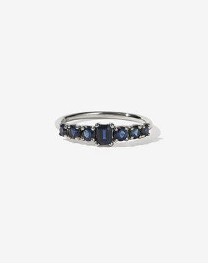 Meadowlark Jewellery’s beautiful Amelie Engagement Ring in Platinum, claw set with emerald cut and round brilliant cut blue sapphires atop a fine round band. Fully traceable and ethically sourced blue and green sapphires from Queensland, Australia. A low set, petite seven stone engagement ring this Ceremonial design made to order in New Zealand.