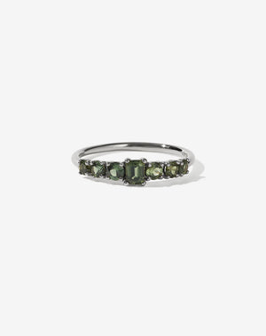 Meadowlark Jewellery’s beautiful Amelie Engagement Ring in Platinum, claw set with emerald cut and round brilliant cut green sapphires atop a fine round band. Fully traceable and ethically sourced blue and green sapphires from Queensland, Australia. A low set, petite seven stone engagement ring this Ceremonial design made to order in New Zealand.