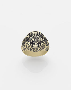 A heavy weighted 9ct solid gold ring with a collage of artworks, designed in collaboration with NZ artist Andrew McLeod.