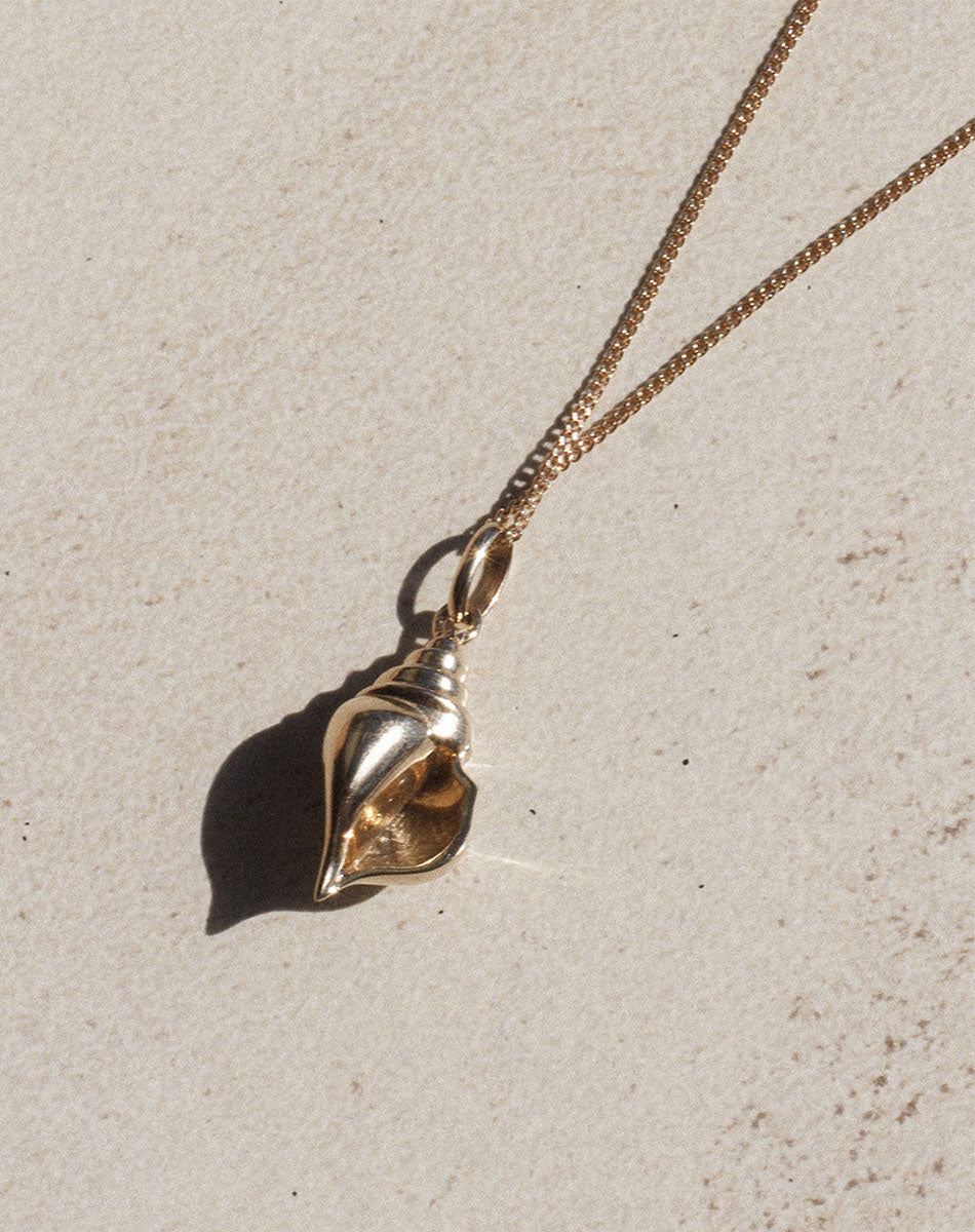 Gold Conch shell Charm Necklace
