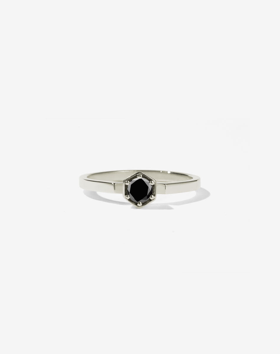 Meadowlark Jewellery’s classic Hexagon Solitaire Engagement Ring in 9ct White Gold, claw set with a 0.25ct round brilliant cut white diamond atop a fine square band. A minimalist, yet bold Ceremonial design made to order in New Zealand.