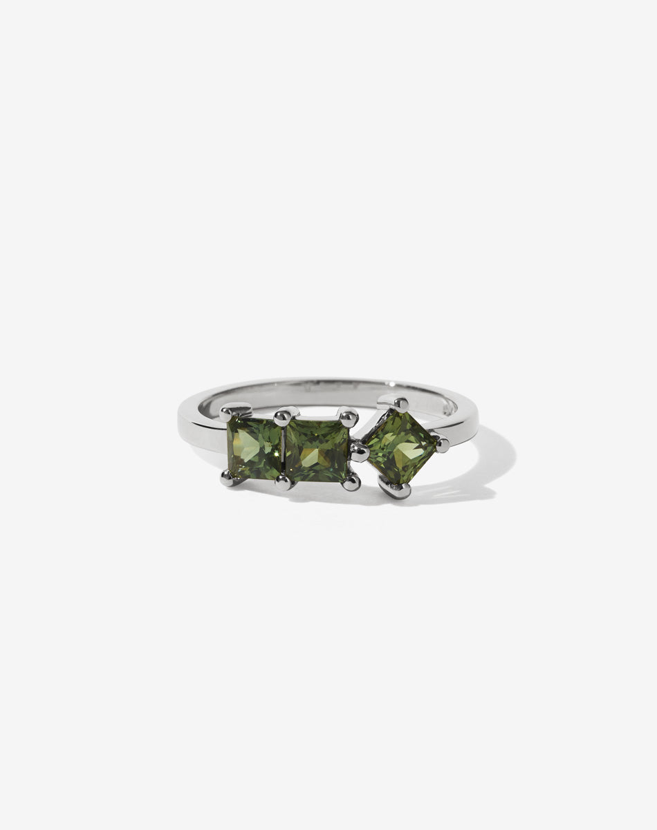 Meadowlark Jewellery’s modern 1.20ct Imogen Engagement Ring in Platinum, claw set with three princess cut white diamonds. Atop a fine square band. A graphic 3 stone engagement ring, inspired by art and architecture, this Ceremonial design is made to order in New Zealand.