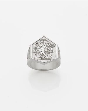 A heavy weighted sterling silver ring with a collage of artworks, designed in collaboration with NZ artist Andrew McLeod.