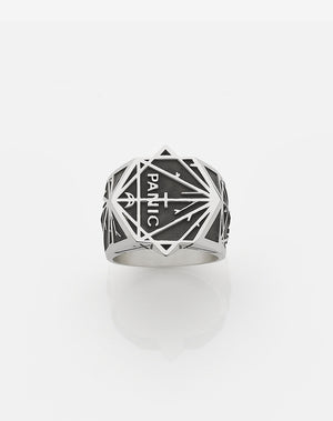 A heavy weighted sterling silver ring with a collage of black artworks designed by Andrew McLeod.