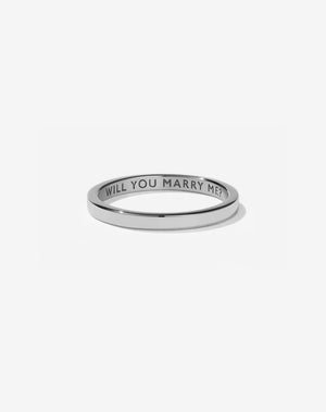 Meadowlark Jewellery’s Stand In Ring in Sterling Silver, engraved with ‘will you marry me’. A 2mm wide minimalist placeholder or proposal ring. This Ceremonial design can be worn as a wedding band and is made to order in New Zealand.